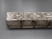 Close view of a rough porous titanium-related material compact