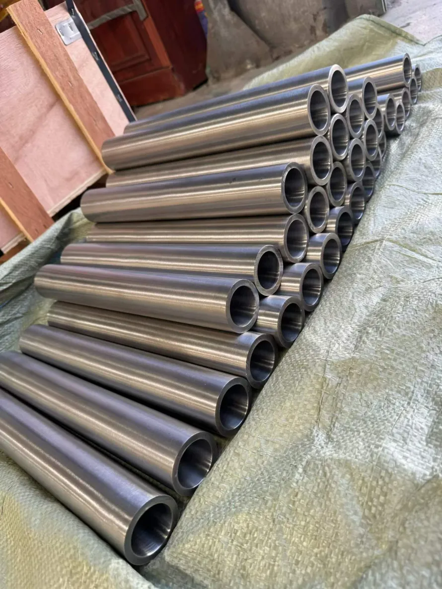 User-owned hollow titanium tube stock used to illustrate the water-excluding channel concept; it is not the RMIT lattice or test specimen