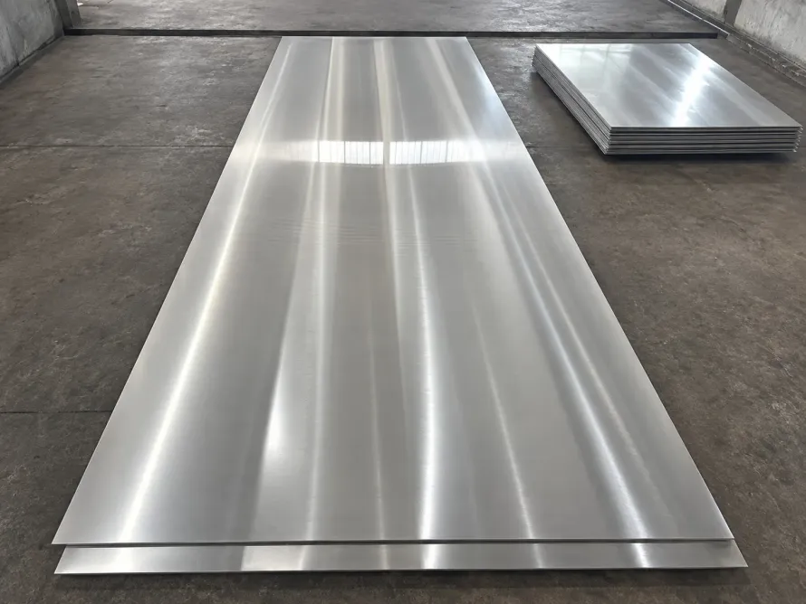 Large brushed metal sheet in a workshop inspection area