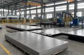 Stacks of titanium plate in a processing workshop, showing why supersonic aircraft programs need product-form and route evidence before release.