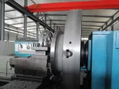 User-owned titanium machining scene used as context; it is not the machine, tool or specimen in the reported TC4 study