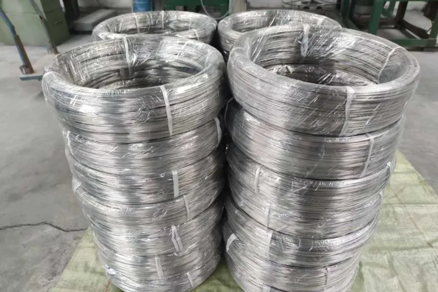 Titanium wire coils prepared for controlled feedstock handling, a reminder that wire-fed routes depend on batch identity, surface condition, storage and traceability before deposition begins.