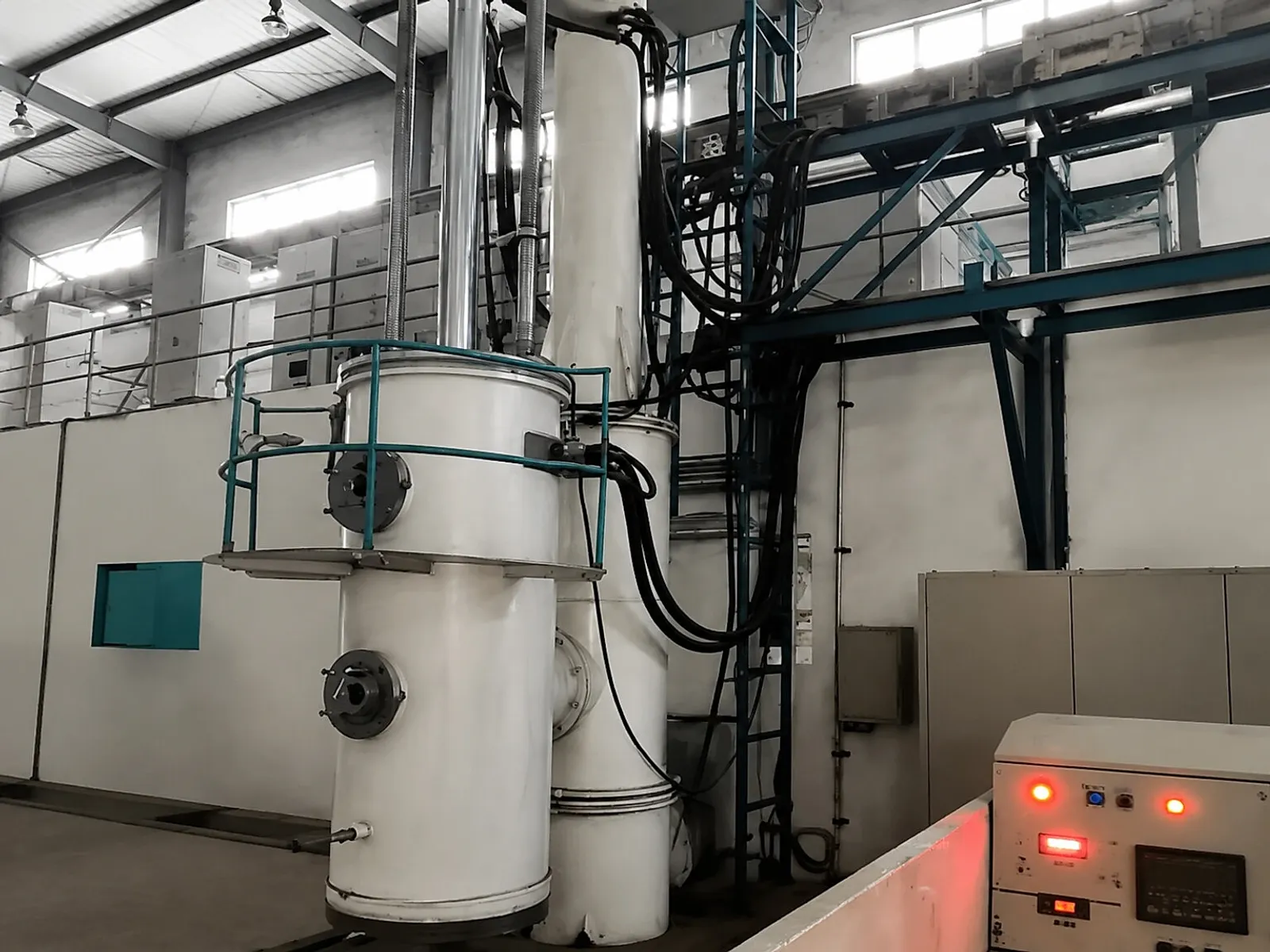 Vacuum and furnace equipment inside a titanium processing workshop, illustrating why powder capacity has to be connected to process control, safety review and release evidence