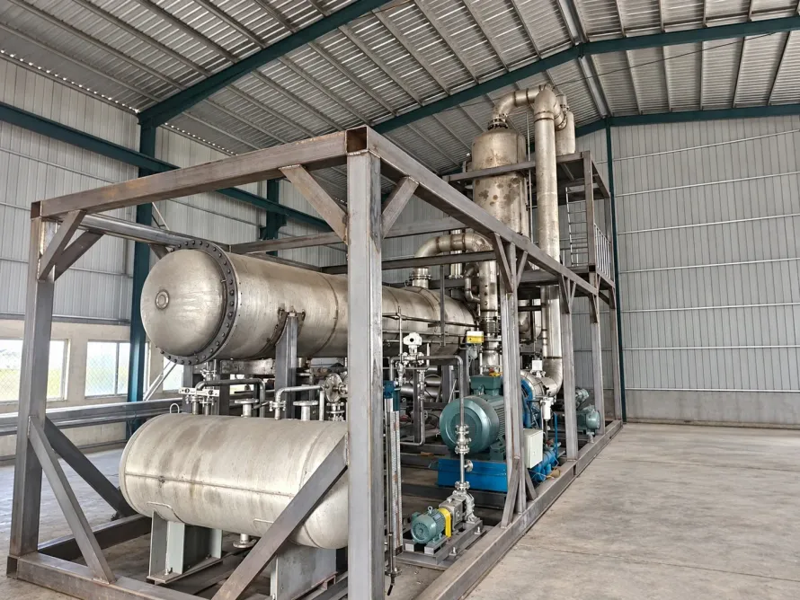 Industrial equipment skid with vessels, pumps and piping in a workshop