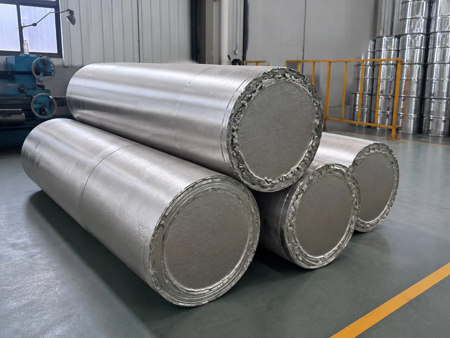 User-supplied titanium billet stock illustrates the upstream material form before complex hot working; it is not Ti65 feedstock or study evidence.