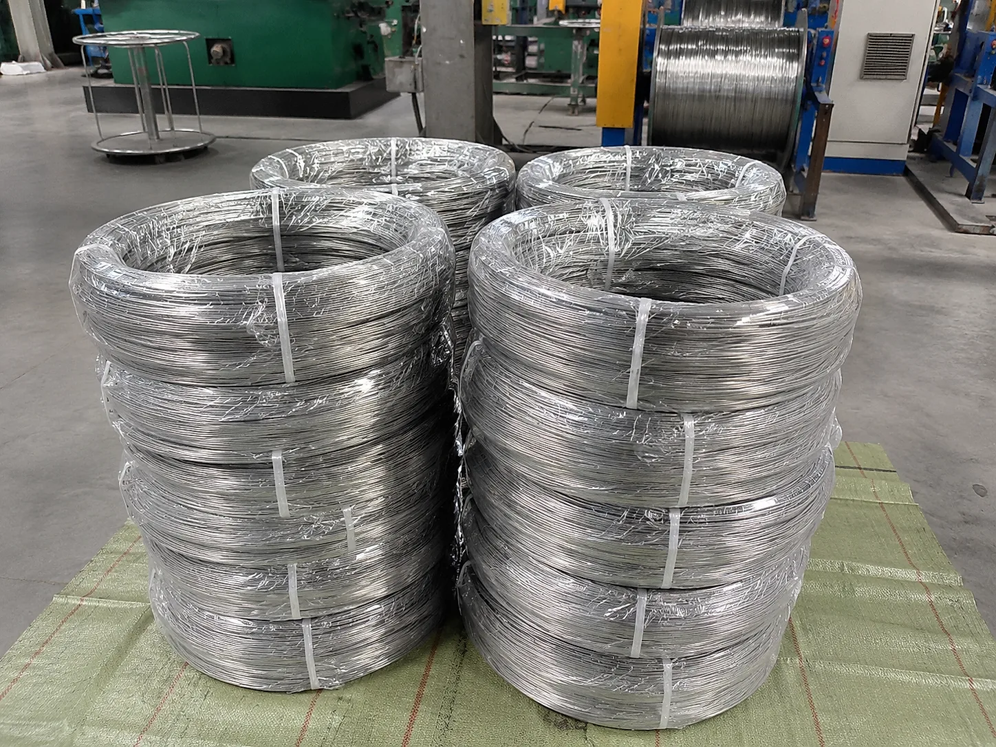 Gr.5 titanium wire coils stocked in workshop: VAR vacuum arc remelting plus drawing plus vacuum annealing route