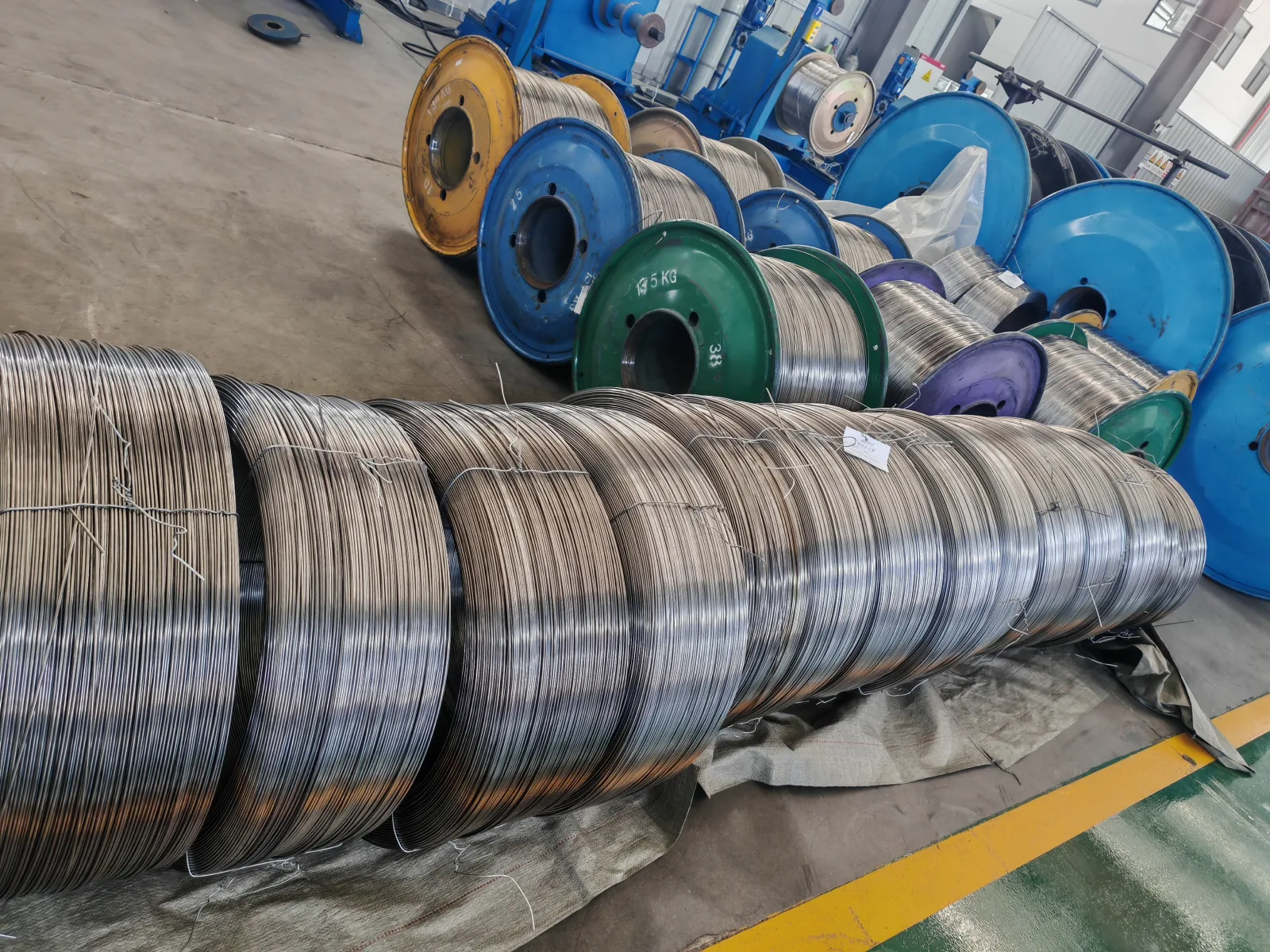 User-supplied titanium wire coils show why material identity and batch control remain upstream evidence, separate from a finished device’s clinical performance.