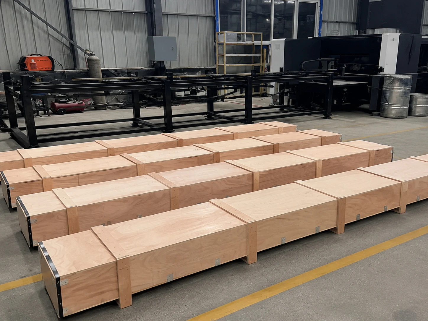 Crated metal parts in a workshop, reinforcing that titanium forging release evidence must travel with packaging, shipment, and final documentation.
