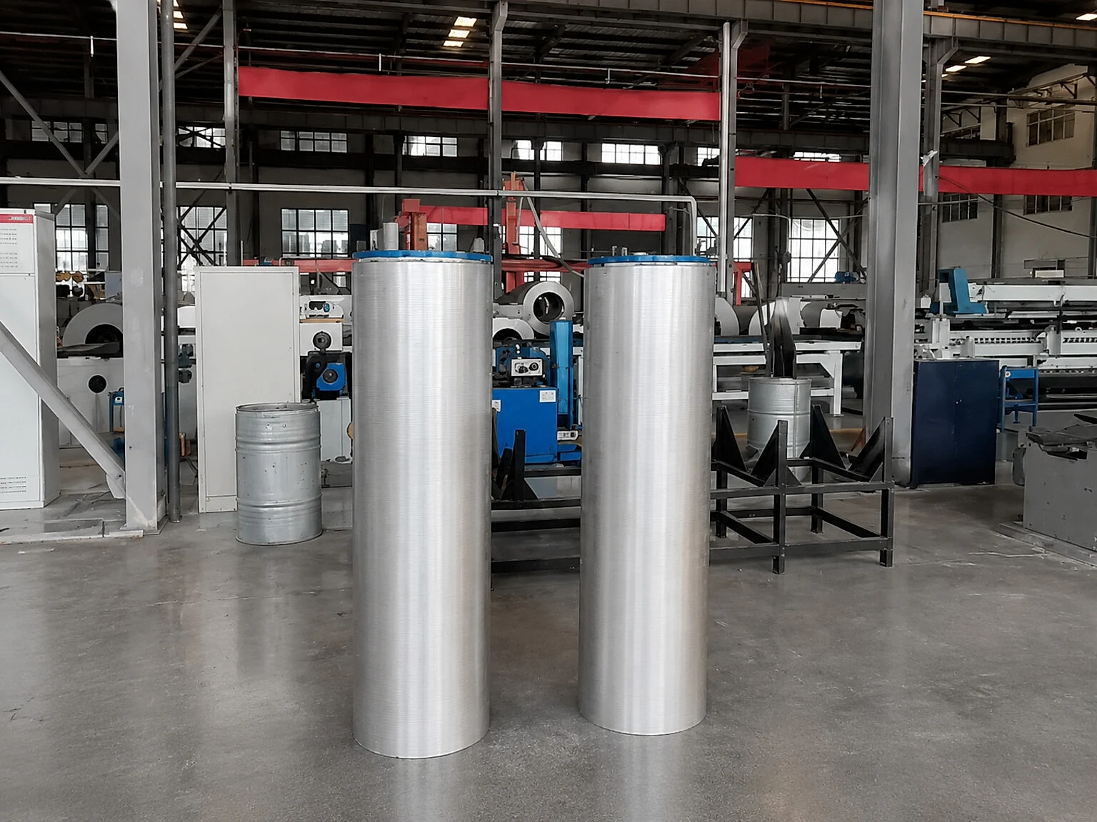 Factory equipment and titanium-like cylindrical stock, illustrating why capacity must be tied to furnace records and release control.
