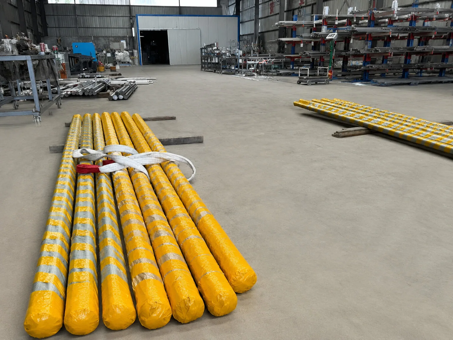 Wrapped titanium bar bundles ready for internal handling show the lot and packaging boundaries that an origin record must preserve through shipment