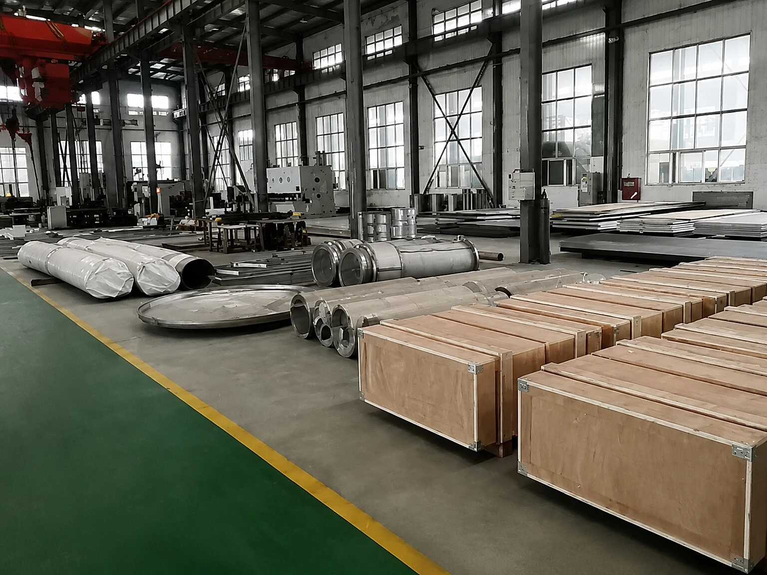Titanium material and export packaging staged in a workshop, showing why capacity announcements still need allocation, storage and shipment evidence before buyers treat material as available