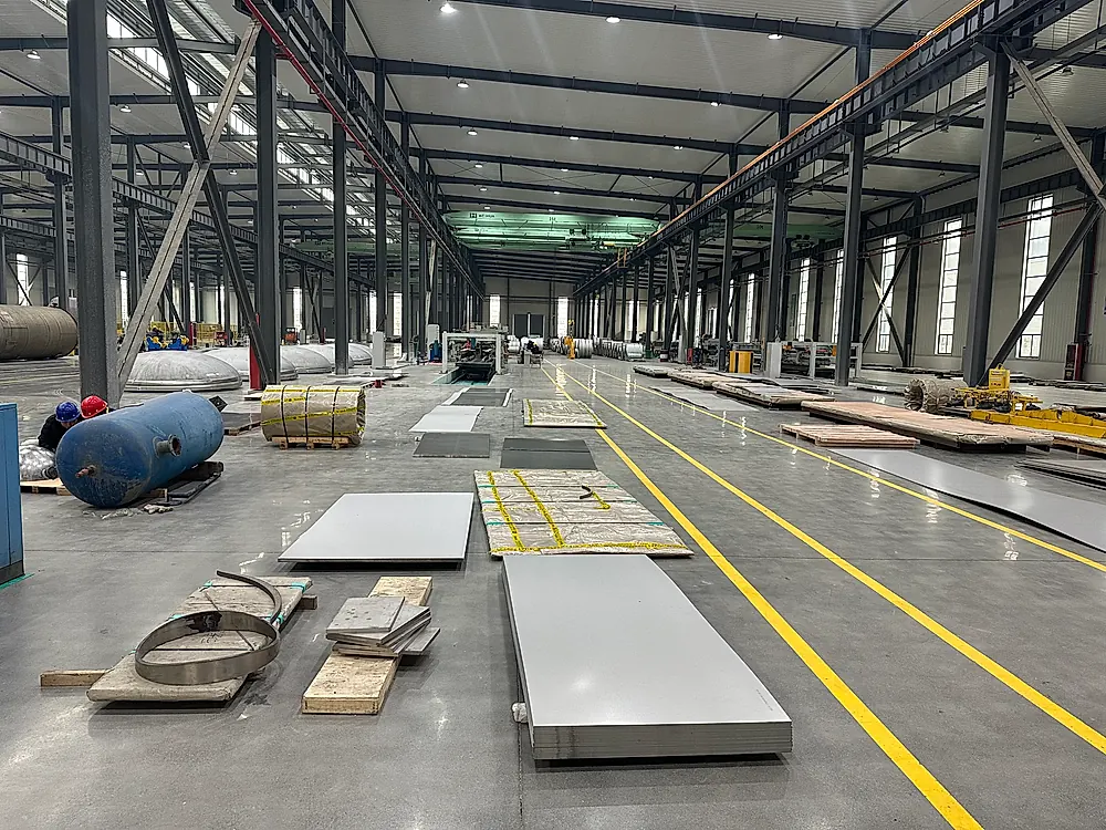 Titanium plate and sheet production facility with coils and flat products
