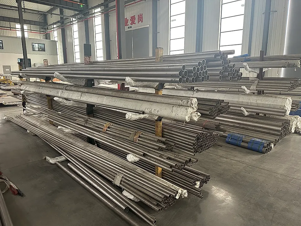 Titanium rod and tube stock in various sizes stored at factory warehouse