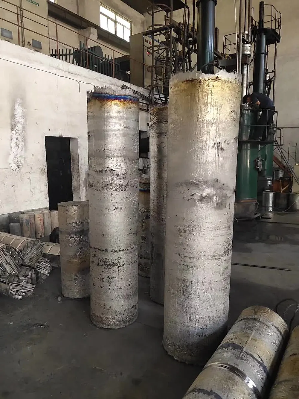 Large titanium ingots in melting workshop