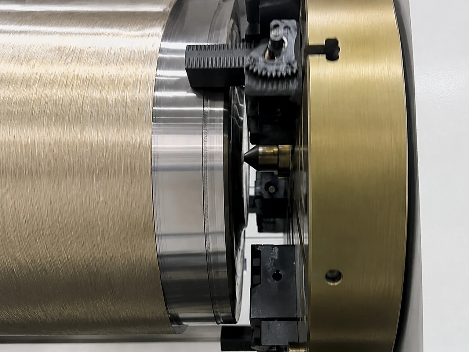 Close machining view of a titanium-like cylindrical part, showing why repair, geometry and route control must stay tied to release records.