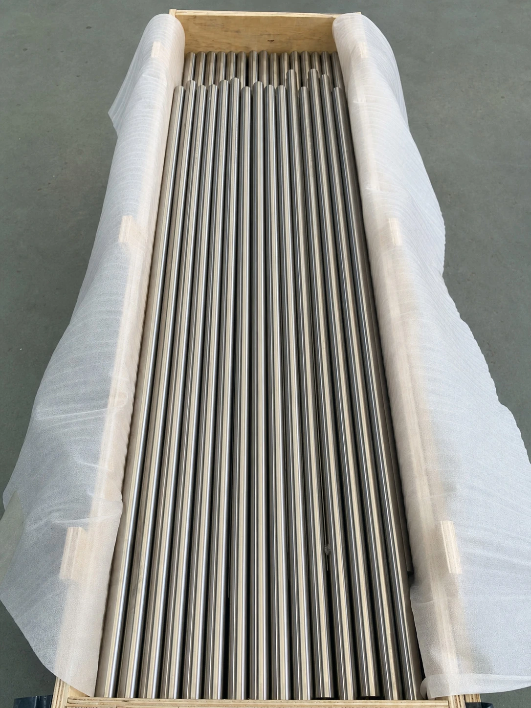 Polished titanium bars wrapped for shipment